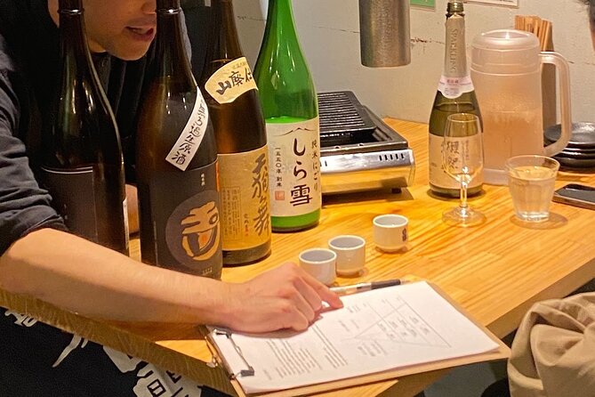 10 kinds Sake Tasting Experience in Tsukiji with local!! - Snacking Your Way Through 10 Sips: Nuts, Soy, and Calm Between Courses