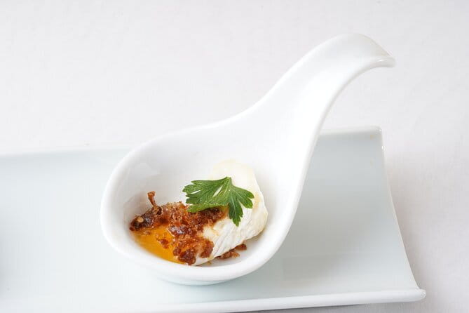 Experience a western twist on Japanese sake snacks - Price and Value: $36.24 for Brunch, Alcohol, and Multiple Tastings