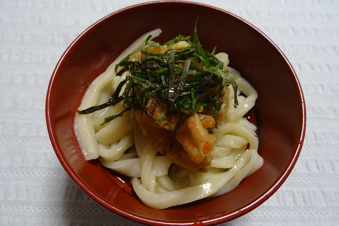 Experience all of Japanese culture and Japanese food experience classes "origami, udon, Japanese food, green tea, calligraphy" in 4 hours - The real draw: a Tokyo home visit with food, art, and talk