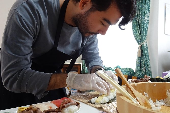 Experience all of Japanese culture and Japanese food experience classes "origami, udon, Japanese food, green tea, calligraphy" in 4 hours - Sushi and gyoza lunch, plus tempura and small plates
