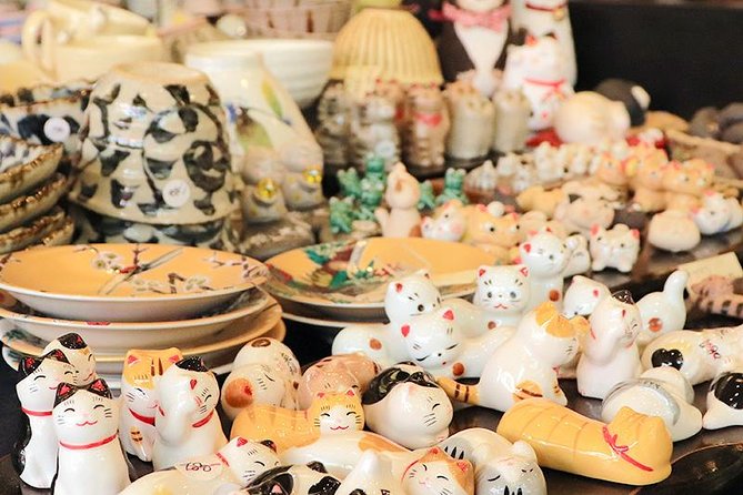 Experience Old local Tokyo & traditional food in Yanaka Ginza - Yanaka Ginza snack lane: stamps, cat-tail donuts, and fried menchi-katsu