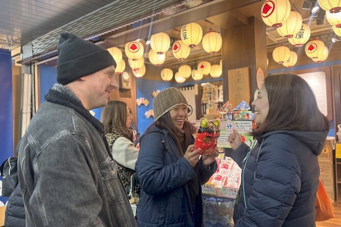 Explore Asakusa's historic landmarks - Kaminarimon Gate: Fujin and Raijin plus the photo magnet