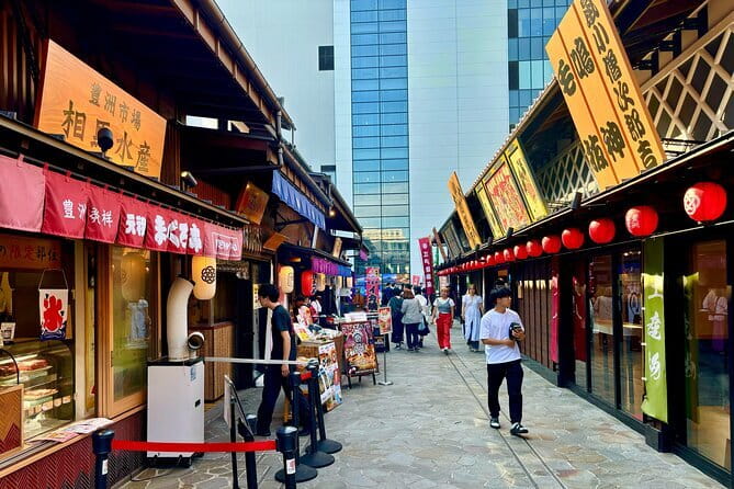 Fish Market & Tokyo Skyline Private Walking Tour - Aqua City, the Liberty Replica, and the Unicorn Gundam Stop