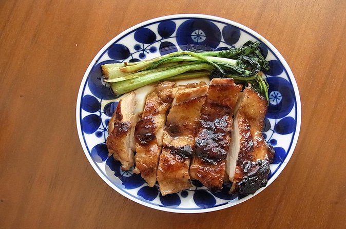 Hands-on Japanese Cooking in a Shinjuku Home Kitchen with Satoru - The best part: eating your meal with Satoru (and a local drink)