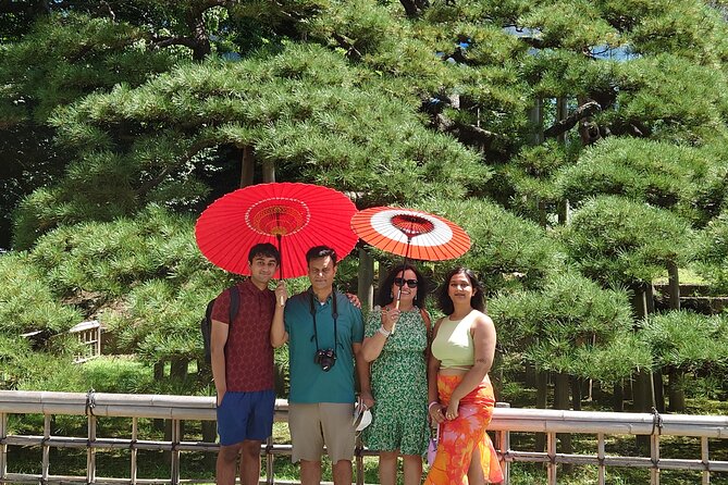 Kamakura Full Day Tour with Licensed Guide and Vehicle from Tokyo - Yuigahama Beach and Komachi Street: ocean air, then snack and shopping time