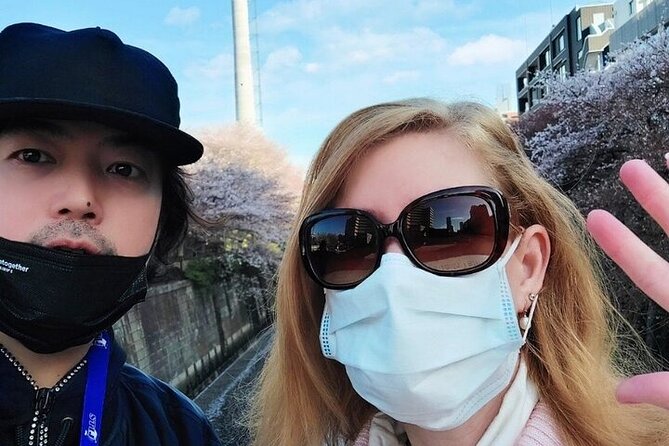 Licensed Guide Tokyo Meguro Cherry Blossom Walking Tour - Stop 1: Meguro River photos, river-side shops, and the right walking rhythm