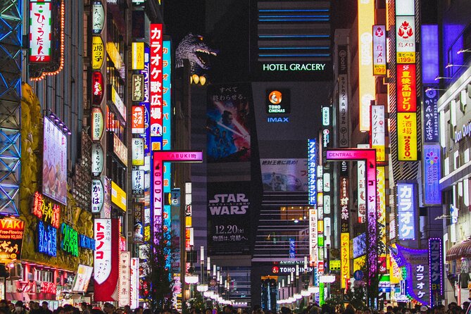 Private Shinjuku Nightlife Walking Tour & Golden-Gai Bar Crawl - Golden Gai Stop: tiny bars, real etiquette, and drink minimums