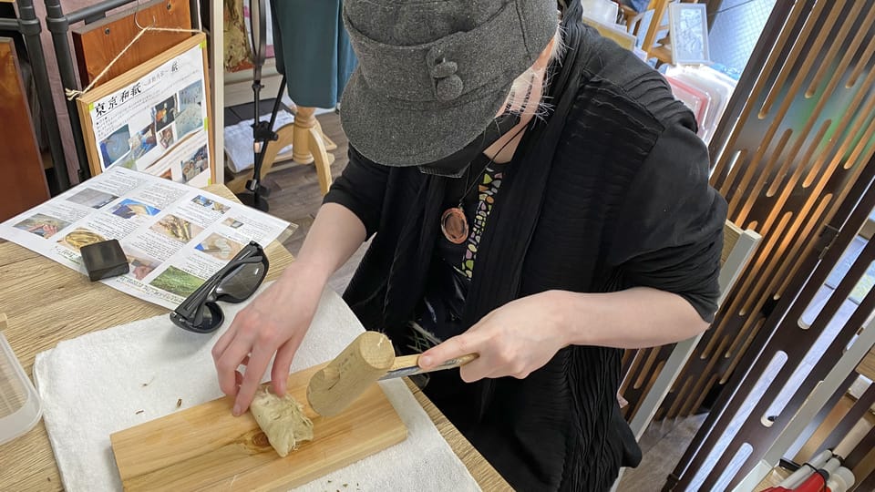 Private Workshop for Making Paper Last 1,000 years in Ueno - The cozy details: instructor care, work clothes, and Kami-chan the cat