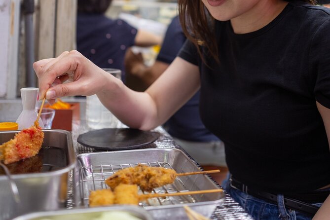 Shibuya by night in Small Groups: Neon Lights and Local Flavors - Stop 2: Miyashita Park for modern Tokyo on an elevated level