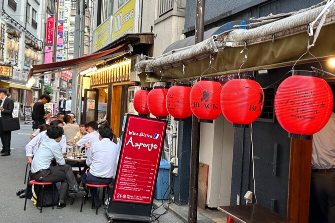 Shimbashi Tastes & Stories A Culinary Foodie Tour By Local Guide - The Shimbashi building and Tanuki Alley history you’ll notice on the walk