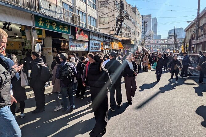 Small Group Food Guided Walking Tour of Tokyo - Stop 1: Tsukiji Hongwanji Temple for photos and a short pause
