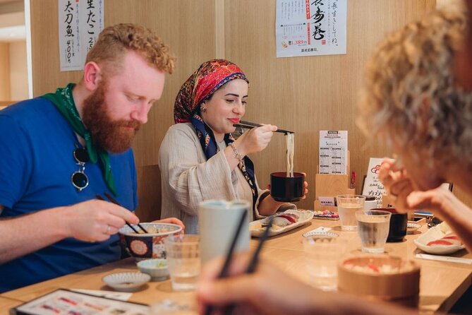 Tokyo After 5: Authentic Japanese Food & Drink Night Tour - Stop 3: Tsukishima Monja Street and monjayaki cooked at your table
