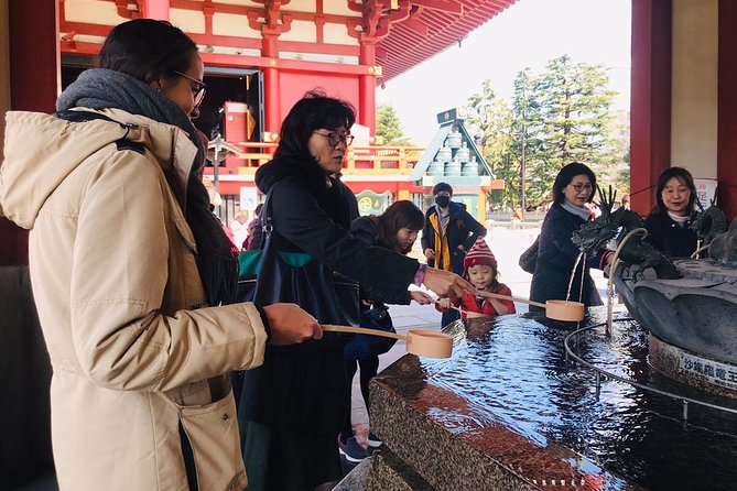Tokyo Asakusa Half Day Walking Tour with Local Guide - Entering Senso-ji the right way: worship steps, fortune, and prayer