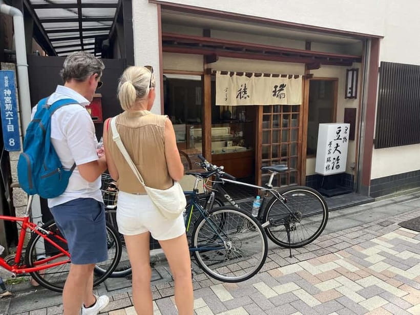 Tokyo Bike Tour: Shibuya, Harajuku & Hidden Gems - Japan National Stadium photo moment and the return to Umayamichi Park