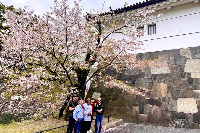 Tokyo Cherry Blossoms blooming spots E-bike Tour, 3hrs - Kensei Kinenkan: Getting Off the Bike for a Final Blossom Break