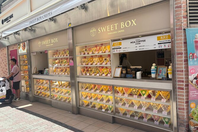 Tokyo Harajuku Walking Tour Meiji Jingu Yoyogi Park and More - Stop 4: Omotesando Avenue for modern architecture and upscale browsing