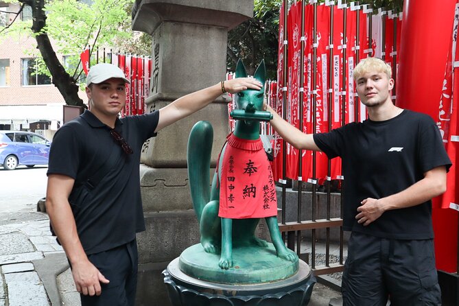Tokyo Hidden Shrine and Temple Tour - Toyokawa Inari Temple: fox statues and a rare Shinto-Buddhist mix