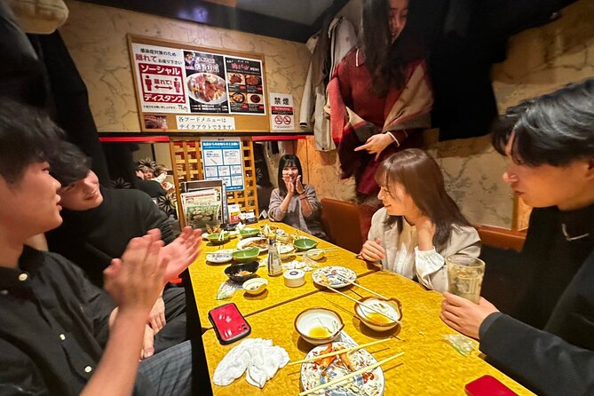 Tokyo: Private Shibuya Bar Crawl Tour -3 Drinks & Local Foods- - Stop 1: Tengu Dai Hall in Shibuya Mark City for big-izakaya energy
