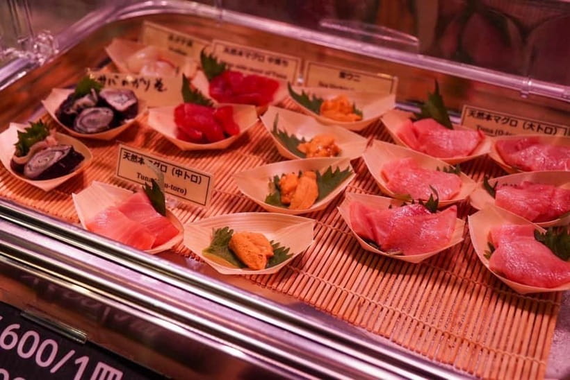 Tokyo: Private Tsukiji Street Food & Sake with Local Guide - Tea tasting and Edo-style bites: black beans, peanuts, and dashi in context