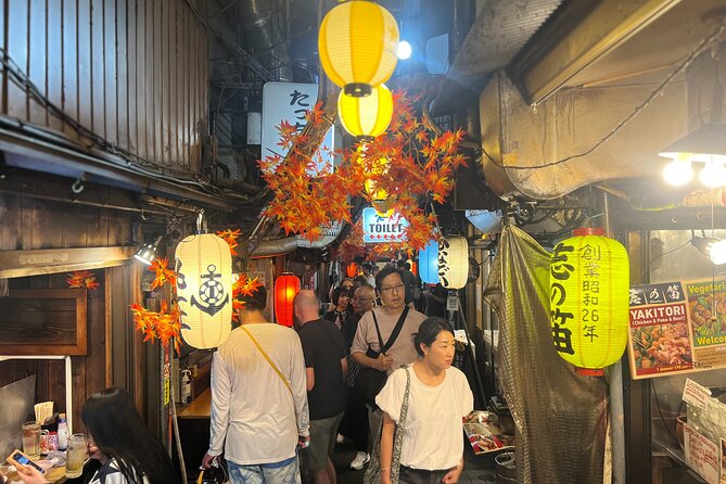 Tokyo: Shinjuku Food Tour (13 Dishes at 4 Local Eateries) - Stop 2: Kabukicho’s Show-District Energy Meets a Traditional Meal