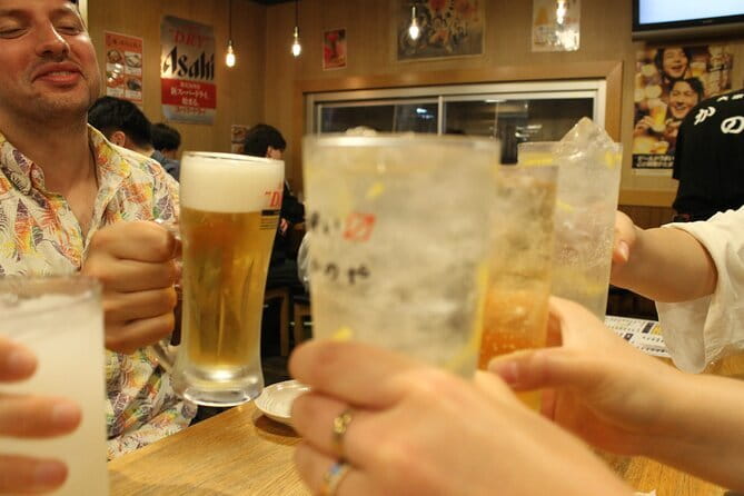 Tokyo Ueno Food Tour Sushi Ramen and Local Favorites - Entering Ameyoko: 400 Shops, Postwar Beginnings, Real Atmosphere