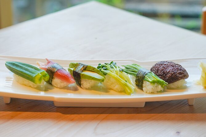 Vegan Friendly Sushi & Okonomiyaki Shibuya Night Foodie Tour - Stop 4: Shibuya Center-gai for old-school street atmosphere